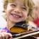 smiling-child-playing-violin